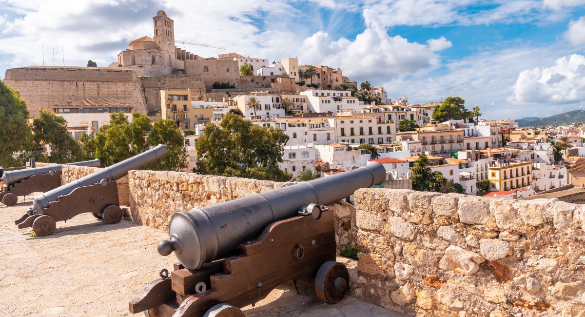 Medieval cannons of the Ibiza castle wall and the cathedral in the background, Balearic Islands, Eivissa